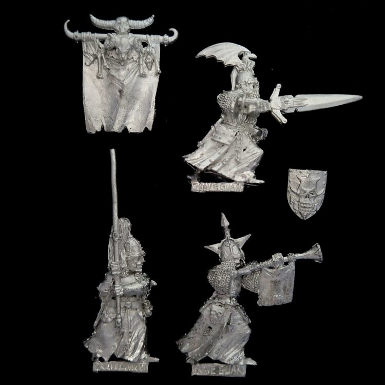 A photo of a Vampire Counts Grave Guard Command Warhammer miniature