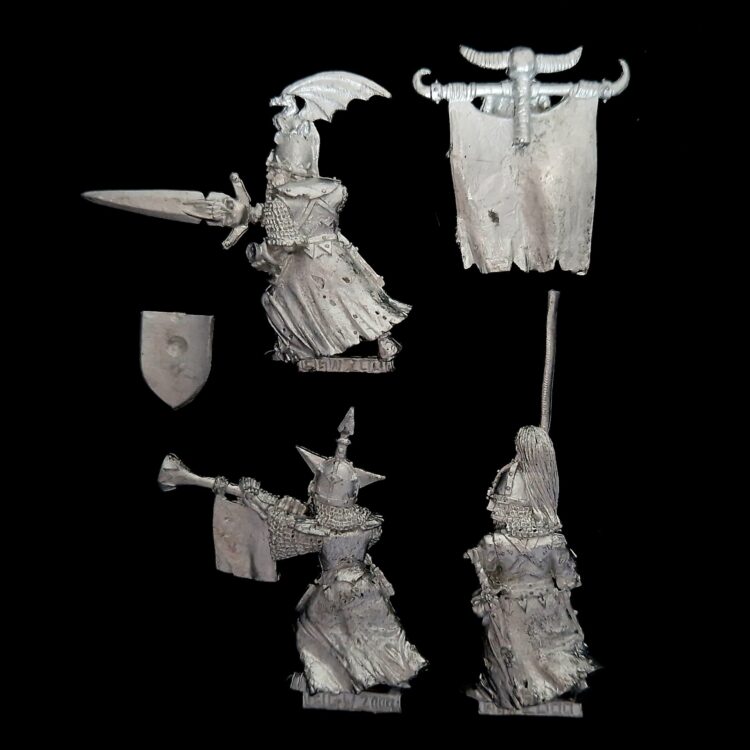 A photo of a Vampire Counts Grave Guard Command Warhammer miniature