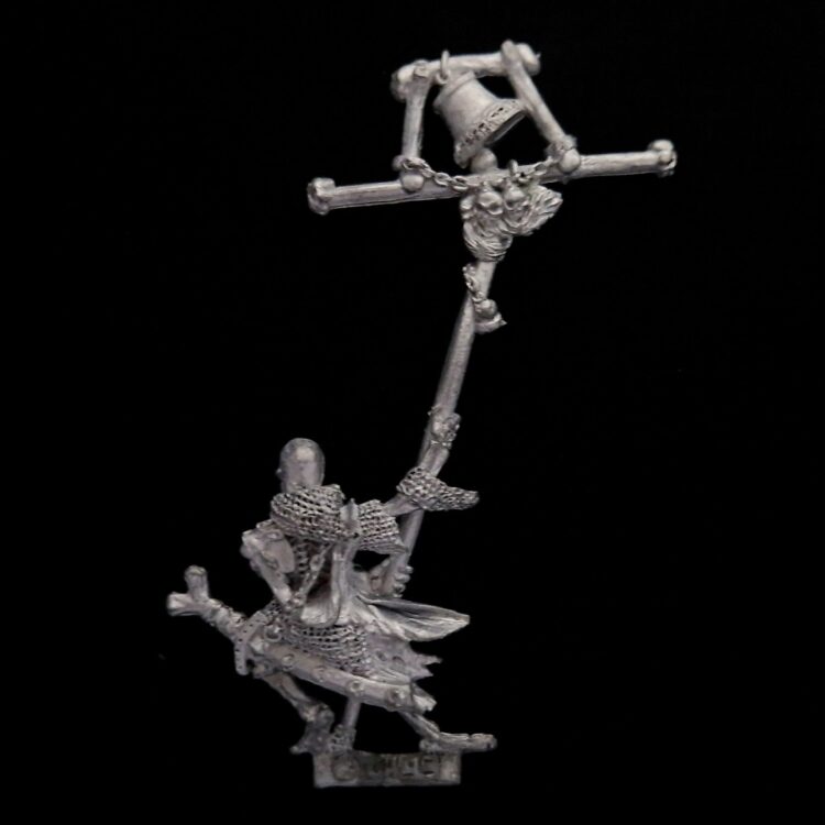 A photo of a Undead Skeleton Standard Bearer Warhammer miniature