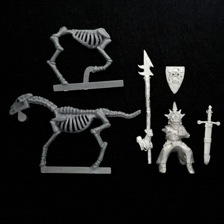 A photo of a Undead Mounted Wight Warhammer miniature
