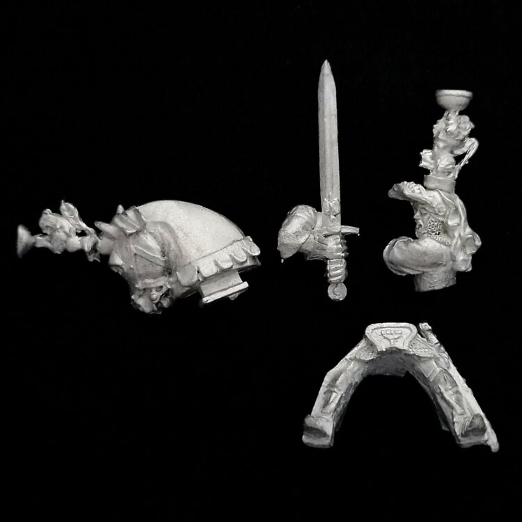 A photo of a Bretonnian Grail Knight Hero With Two Handed Sword Warhammer miniature