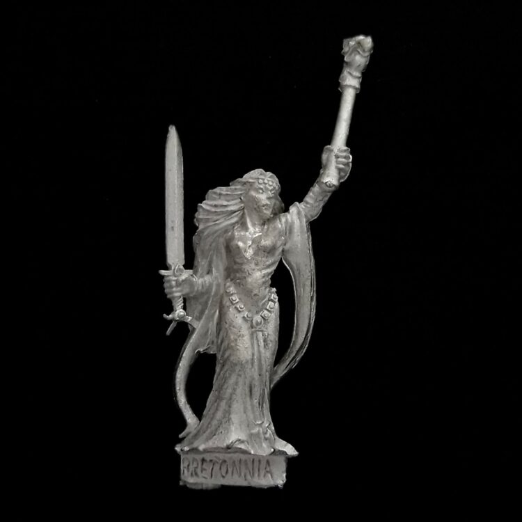 A photo of a Bretonnia Sorceress Warhammer miniature