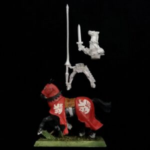 A photo of a Bretonnia Knight of the Realm Champion Warhammer miniature