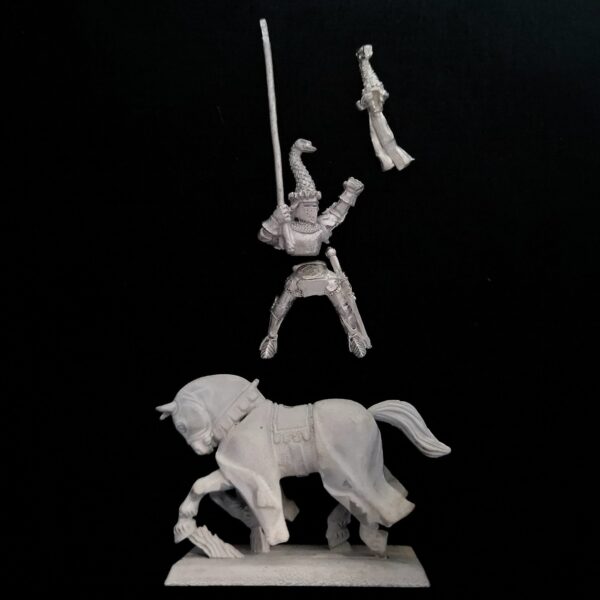 A photo of a Bretonnia Knight of the Realm Standard Bearer Warhammer miniature