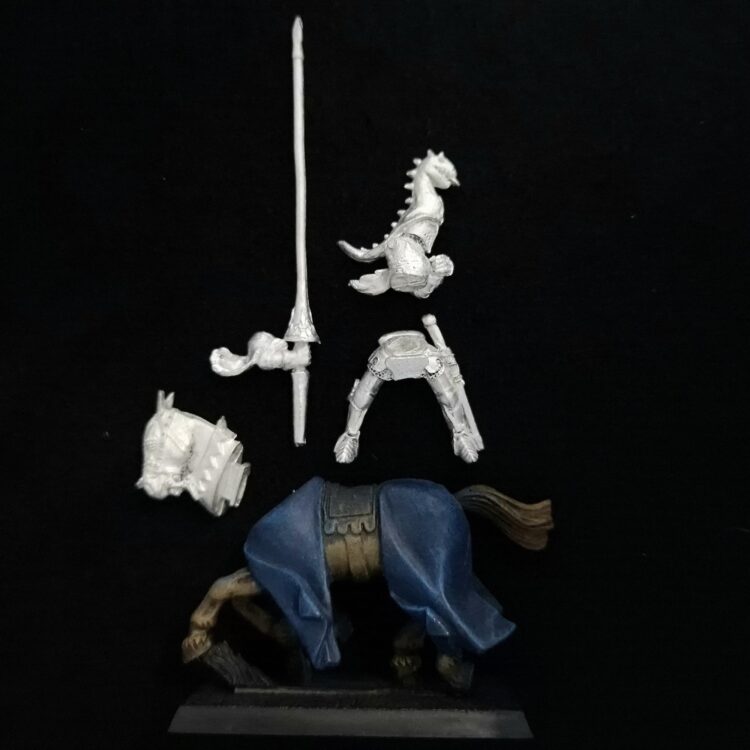 A photo of a Bretonnia Questing Knight Warhammer miniature