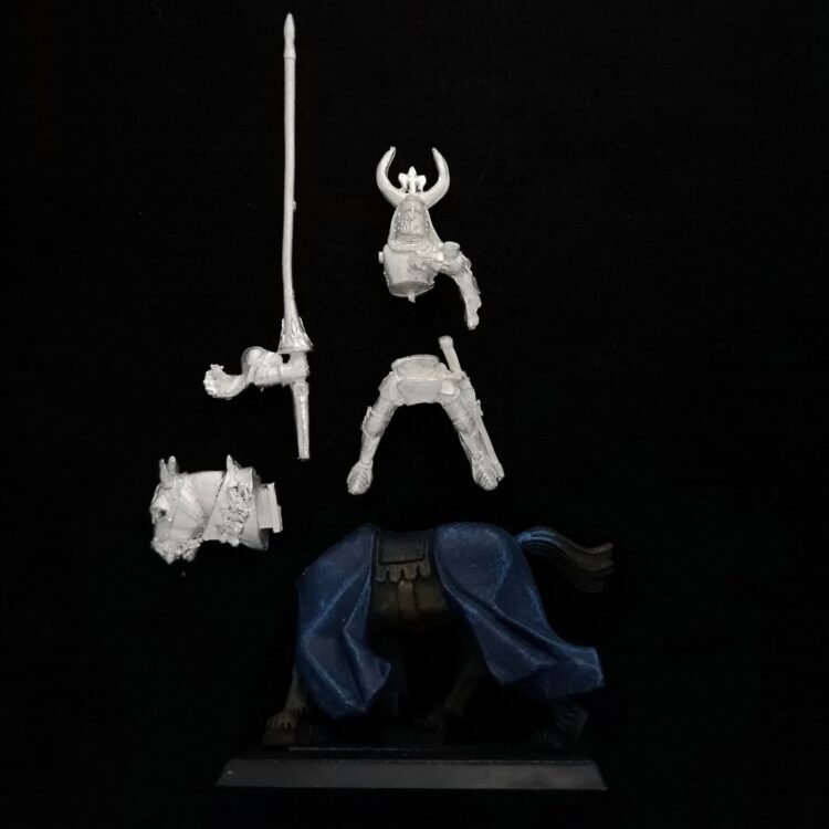 A photo of a Bretonnia Questing Knight Warhammer miniature