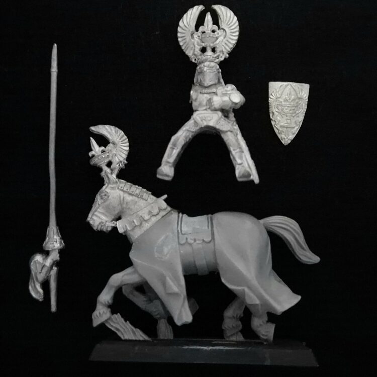 A photo of a Bretonnia Grail Knight Warhammer miniature