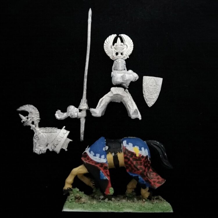 A photo of a Bretonnia Grail Knight Warhammer miniature