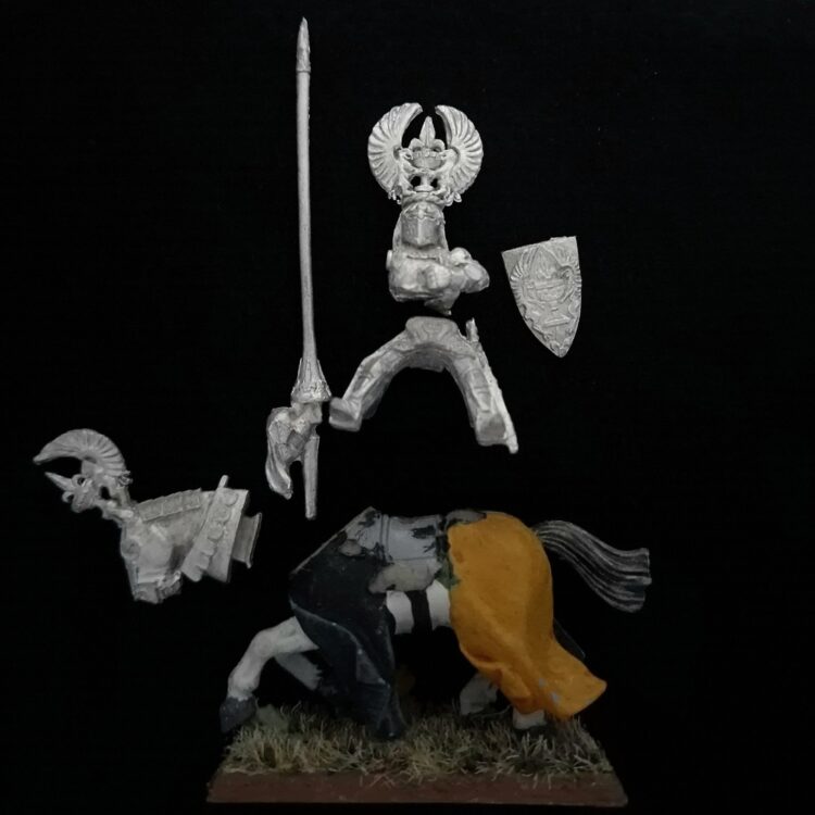 A photo of a Bretonnia Grail Knight Warhammer miniature