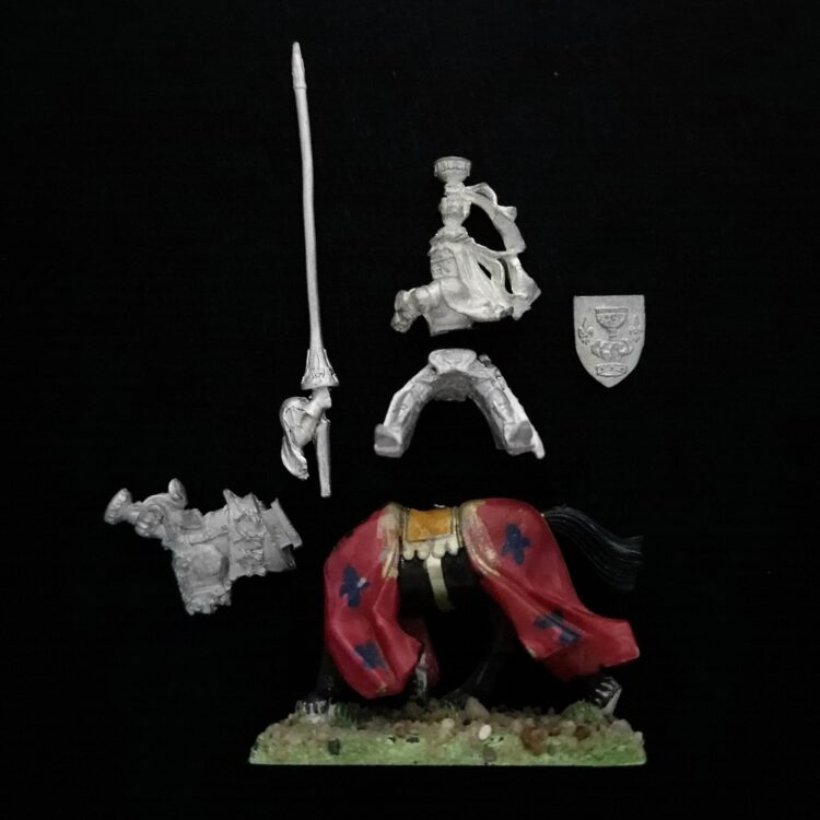 A photo of a Bretonnia Grail Knight Warhammer miniature