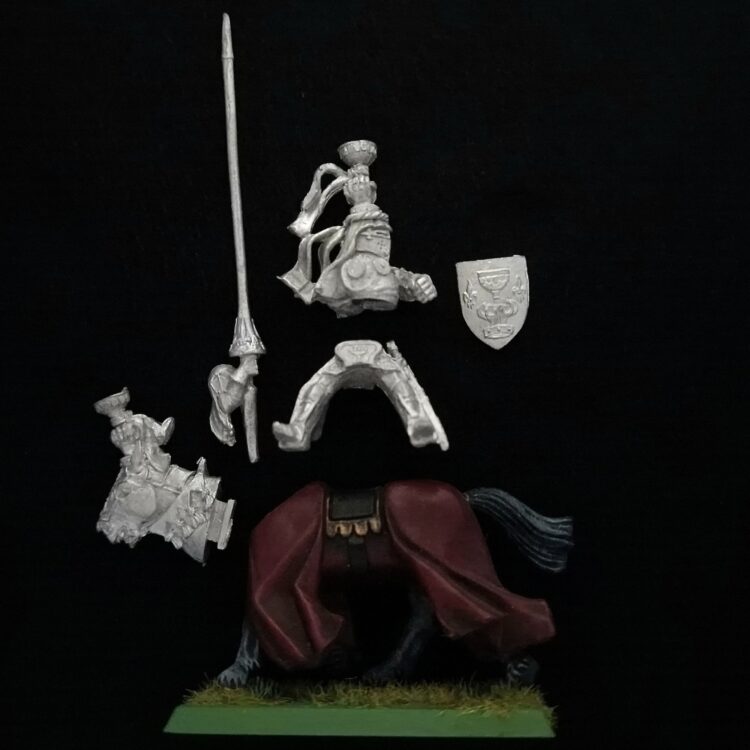 A photo of a Bretonnia Grail Knight Warhammer miniature