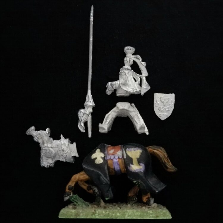 A photo of a Bretonnia Grail Knight Warhammer miniature