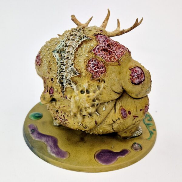 A photo of a Scabeiathrax Exalted Greater Daemon of Nurgle Warhammer miniature