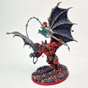A photo of a Chaos Daemons Bloodthirster of Khorne Warhammer miniature