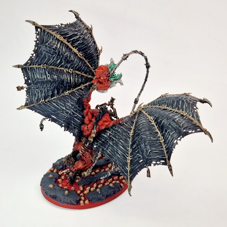 A photo of a Chaos Daemons Bloodthirster of Khorne Warhammer miniature