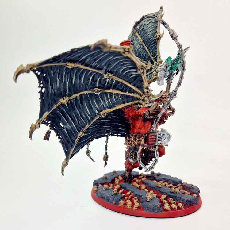 A photo of a Chaos Daemons Bloodthirster of Khorne Warhammer miniature