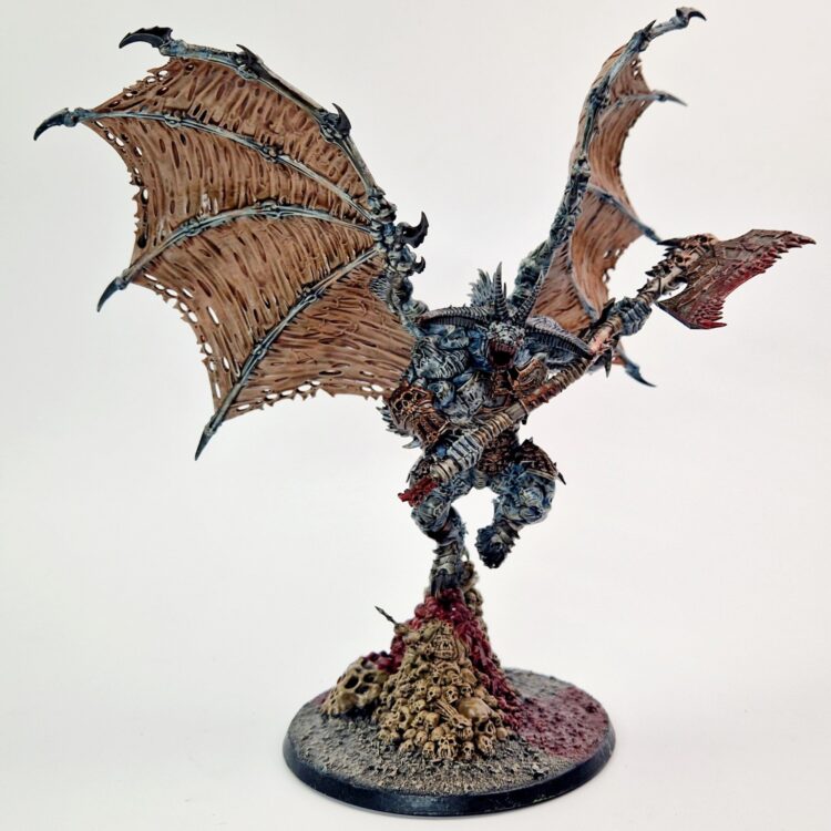 A photo of a Chaos Daemons Bloodthirster of Khorne Warhammer miniature