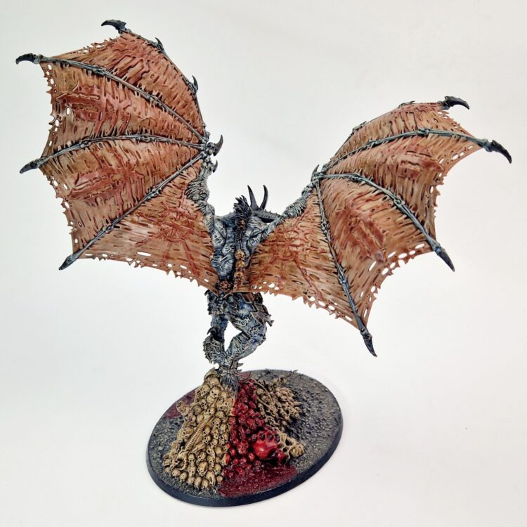 A photo of a Chaos Daemons Bloodthirster of Khorne Warhammer miniature