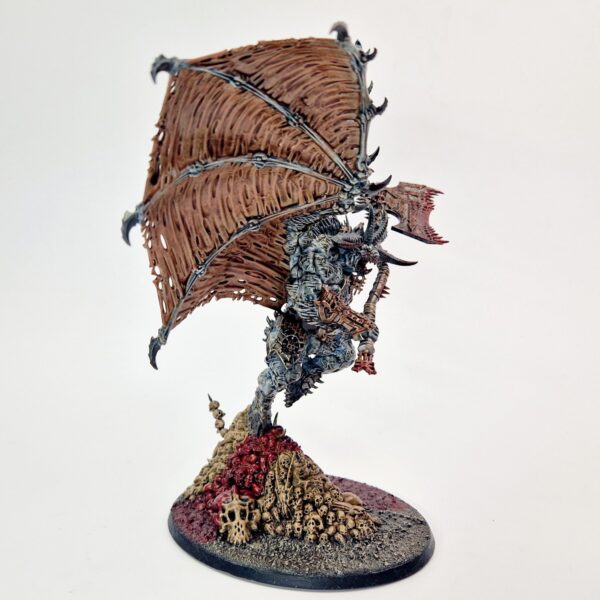 A photo of a Chaos Daemons Bloodthirster of Khorne Warhammer miniature