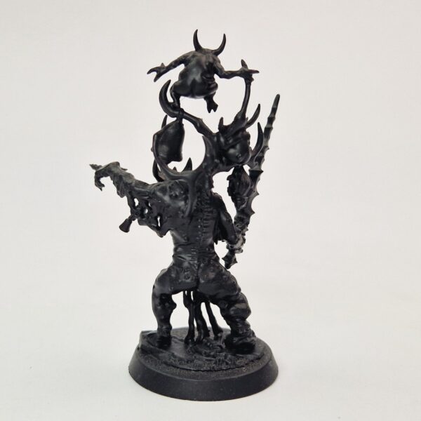 A photo of a Chaos Daemons Poxbringer Warhammer miniature