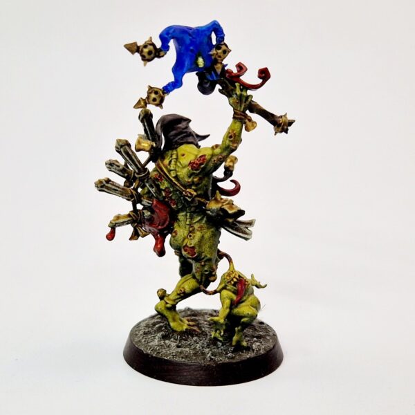 A photo of a Chaos Daemons Sloppity Bilepiper Warhammer miniature