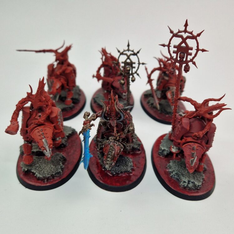 A photo of Chaos Daemons Bloocrushers Warhammer miniatures