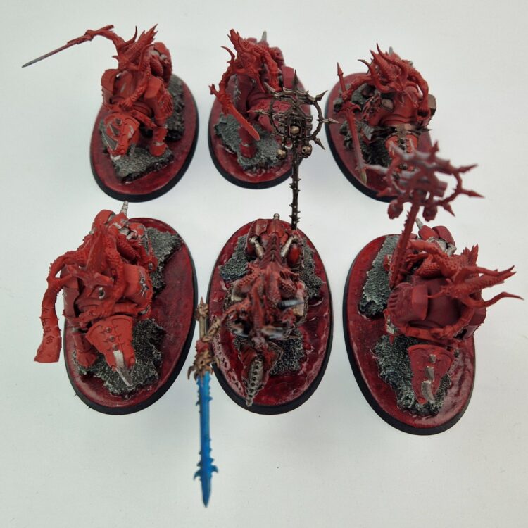 A photo of Chaos Daemons Bloocrushers Warhammer miniatures