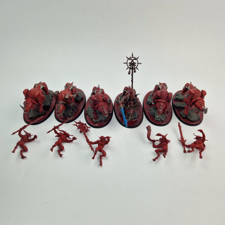 A photo of Chaos Daemons Bloocrushers Warhammer miniatures