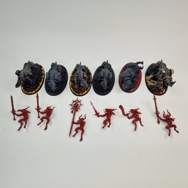 A photo of Chaos Daemons Bloocrushers Warhammer miniatures