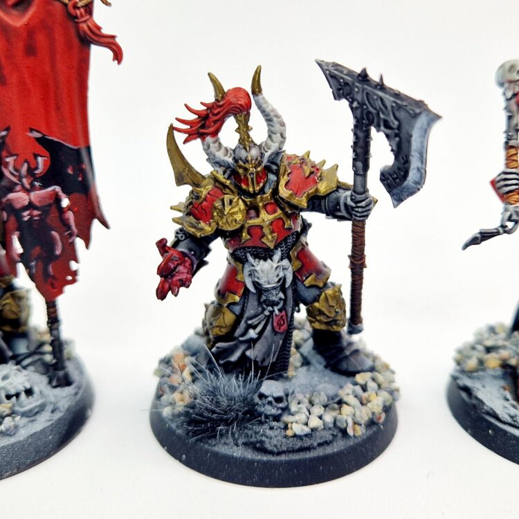 A photo of Chaos Slaves to Darkness Chosen Warhammer miniatures