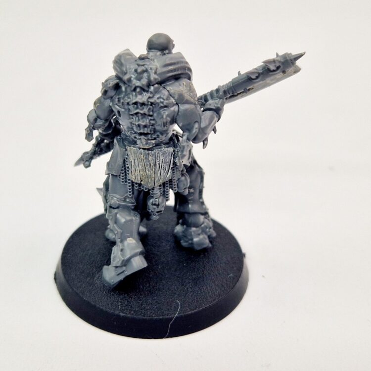 A photo of a Chaos Blades of Khorne Slaughterpriest Warhammer miniature