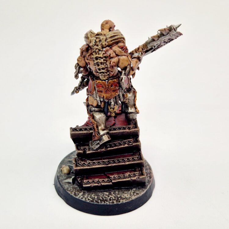 A photo of a Chaos Blades of Khorne Slaughterpriest Warhammer miniature