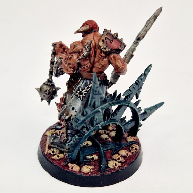 A photo of a Chaos Blades of Khorne Slaughterpriest Warhammer miniature