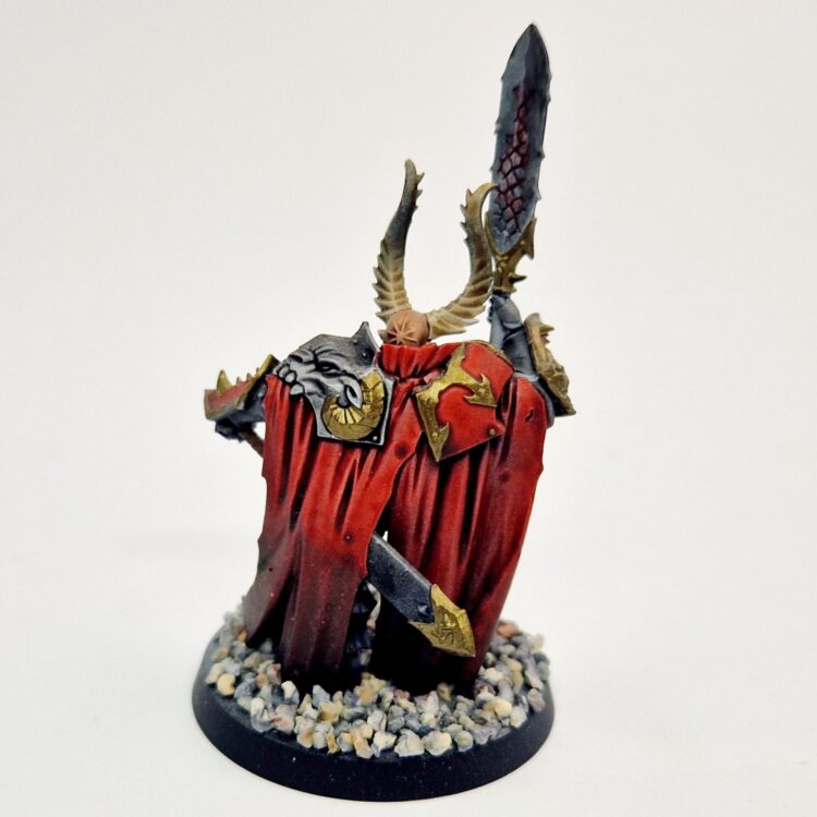 A photo of a Chaos Slaves to Darkness Lord Warhammer miniature