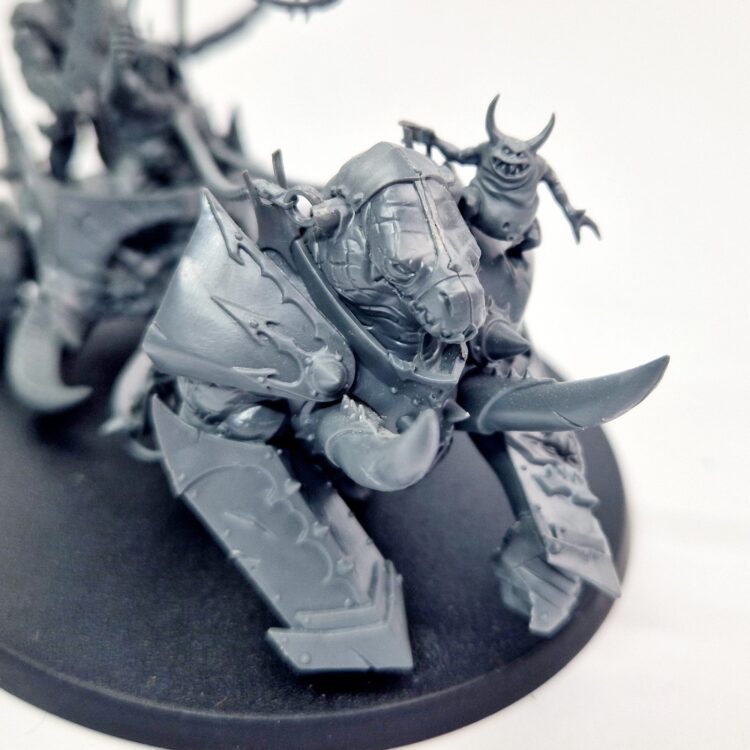 A photo of a Chaos Slaves to Darkness Gorebeast Chariot Warhammer miniature