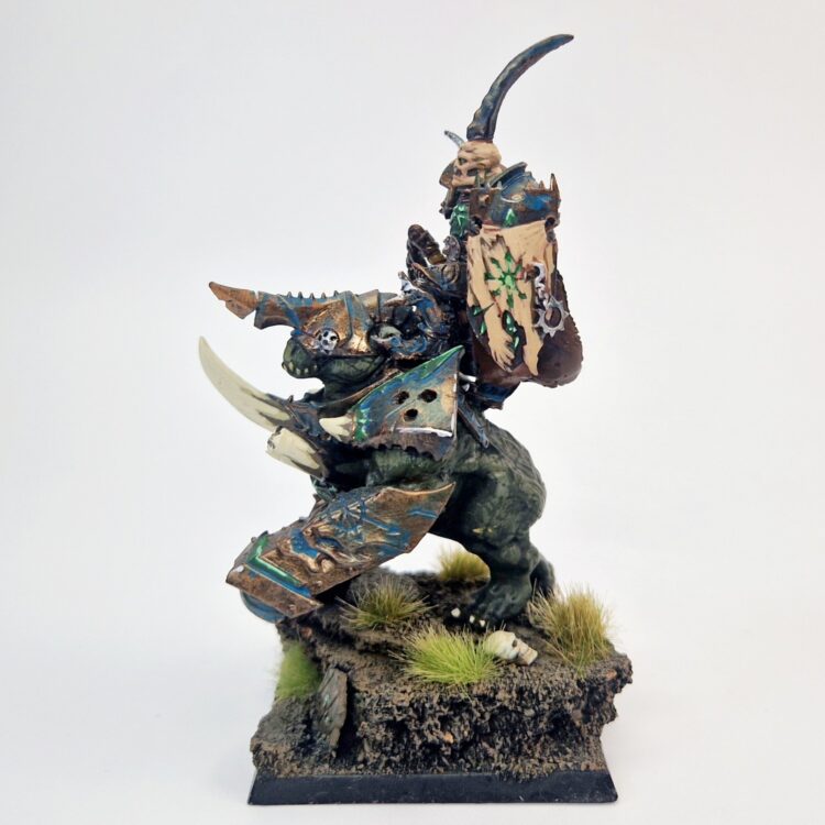 A photo of a Chaos Warriors Lord on Gorebeast Warhammer miniature