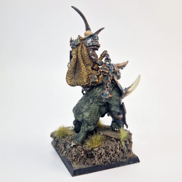 A photo of a Warriors of Chaos Lord on Gorebeast Warhammer miniature