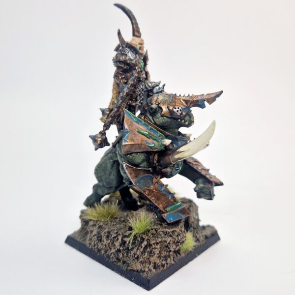 A photo of a Warriors of Chaos Lord on Gorebeast Warhammer miniature