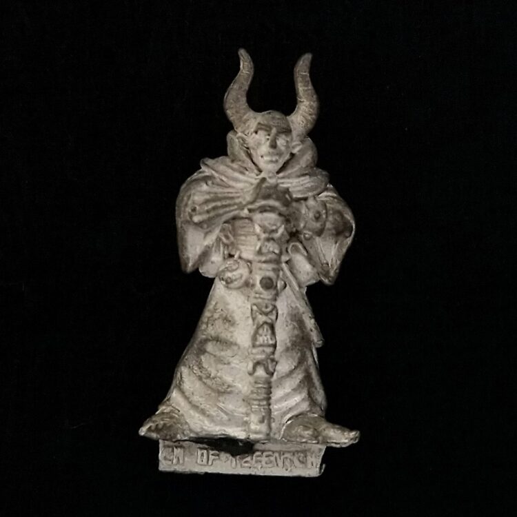 A photo of a Chaos Warriors Champion of Tzeentch Warhammer miniature