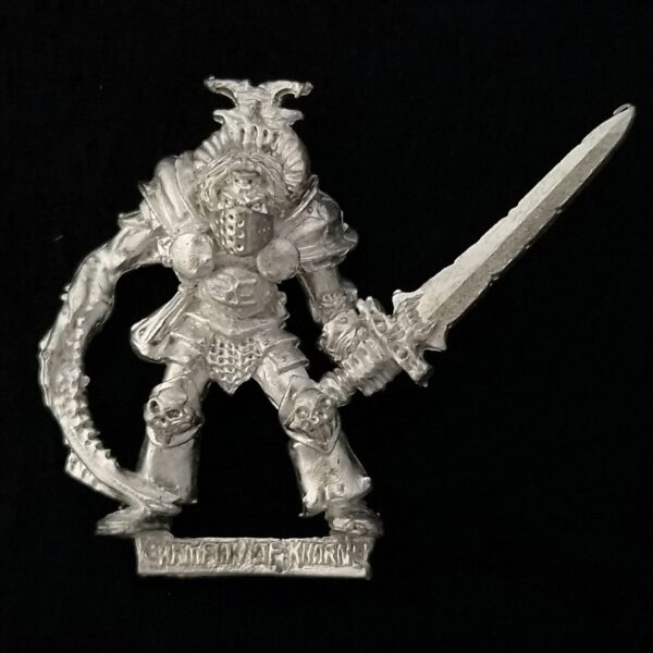 A photo of a Chaos Warriors Champion of Khorne Warhammer miniature