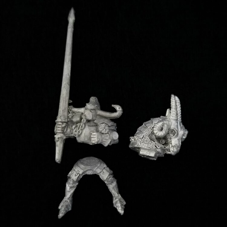 A photo of a Chaos Warriors Knight Warhammer miniature