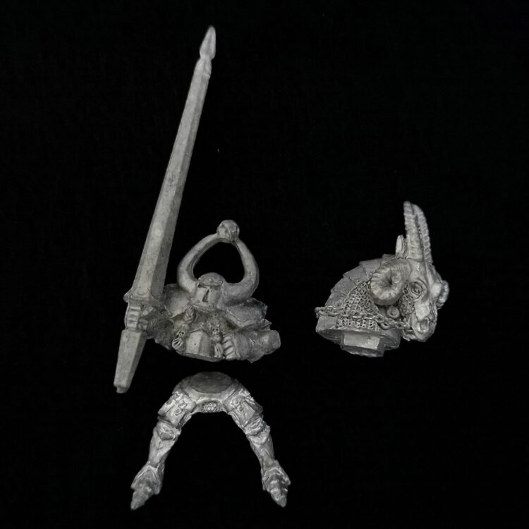 A photo of a Chaos Warriors Knight Warhammer miniature