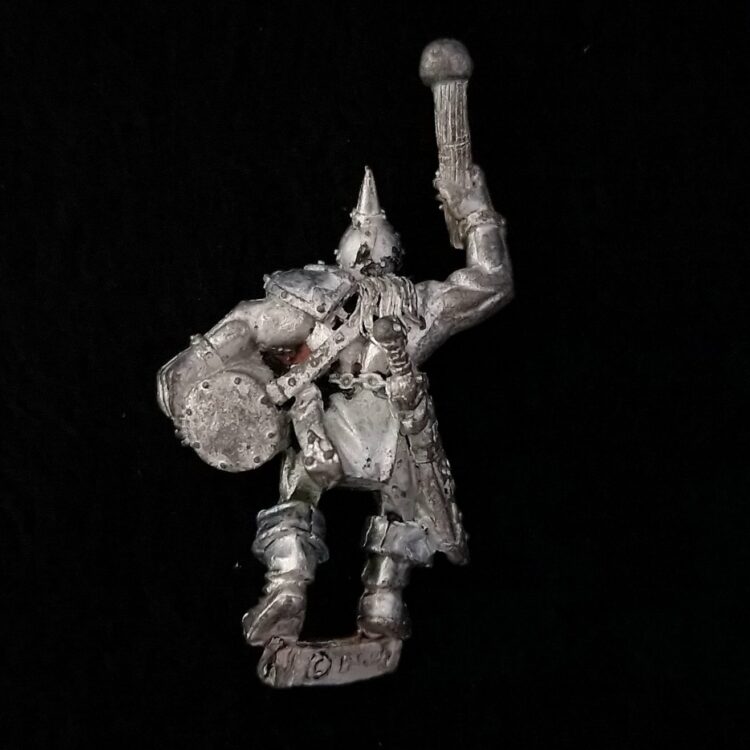 A photo of a Chaos Warriors Marauder Musician Warhammer miniature