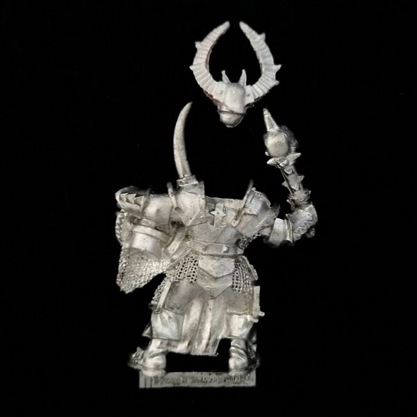 A photo of a Warriors of Chaos Chosen Musician Warhammer miniature