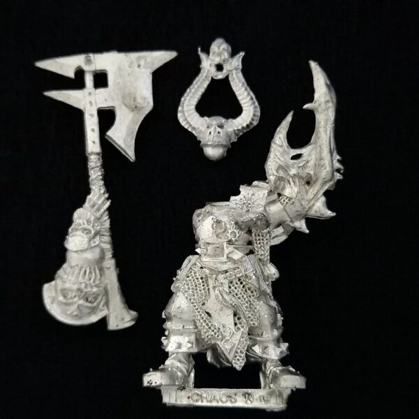 A photo of a Chaos Warriors Chosen Champion Warhammer miniature