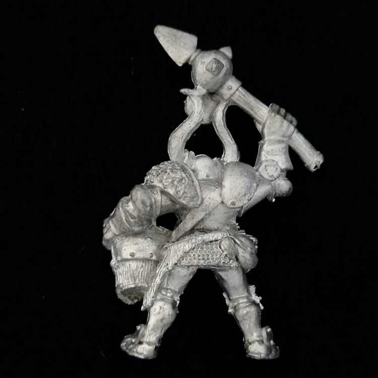 A photo of a Chaos Warriors Musician Warhammer miniature