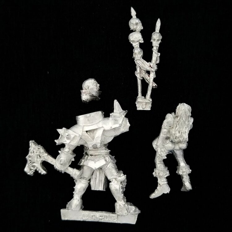 A photo of a Chaos Warriors Limited Edition Champion Warhammer miniature