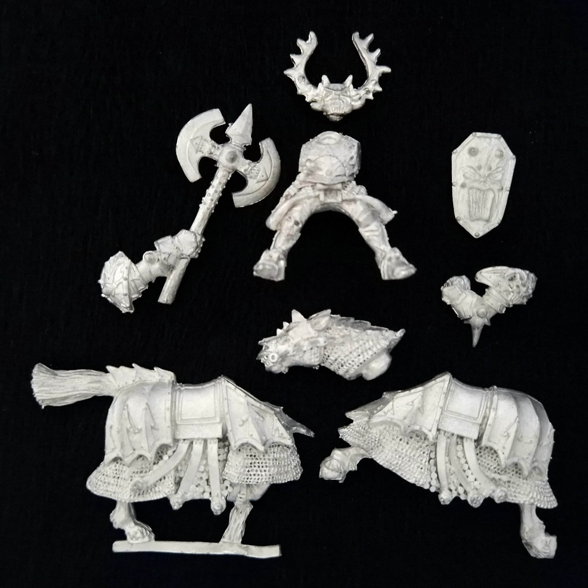 A photo of a Chaos Warriors Lord on Steed Warhammer miniature