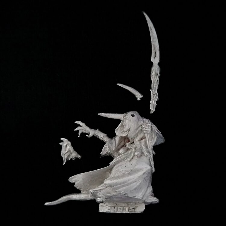 A photo of a Chaos Warriors Limited Edition Sorcerer Warhammer miniature