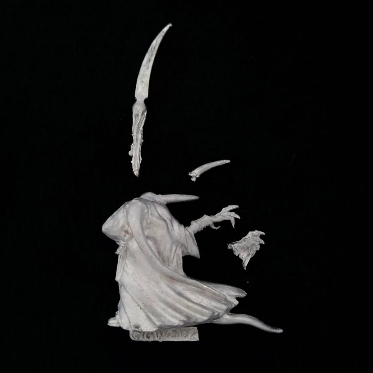 A photo of a Chaos Warriors Limited Edition Sorcerer Warhammer miniature